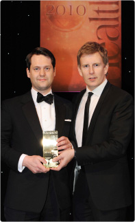 Brian Walters (left) receiving Best Individual Health Insurance award in 2010.